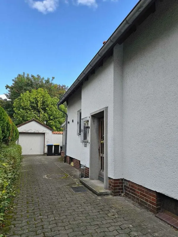 Einfamilienhaus mit Einliegerwohnung mit Garten in ruhiger Lage von Gütersloh – Foto 3